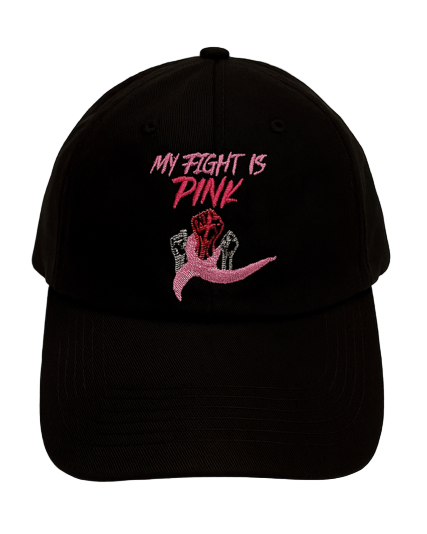 Black baseball cap with “My Fight Is Pink” embroidery and pink awareness ribbon design. Close-up of pink stitching and raised ribbon detail on the Self Inspired Apparel hat.